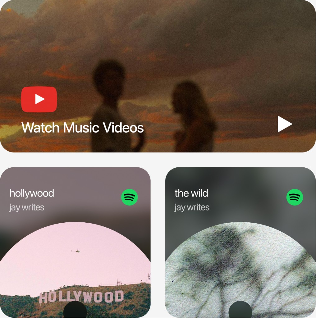 YouTube and Spotify widgets arranged in a bento block layout on Dimensions